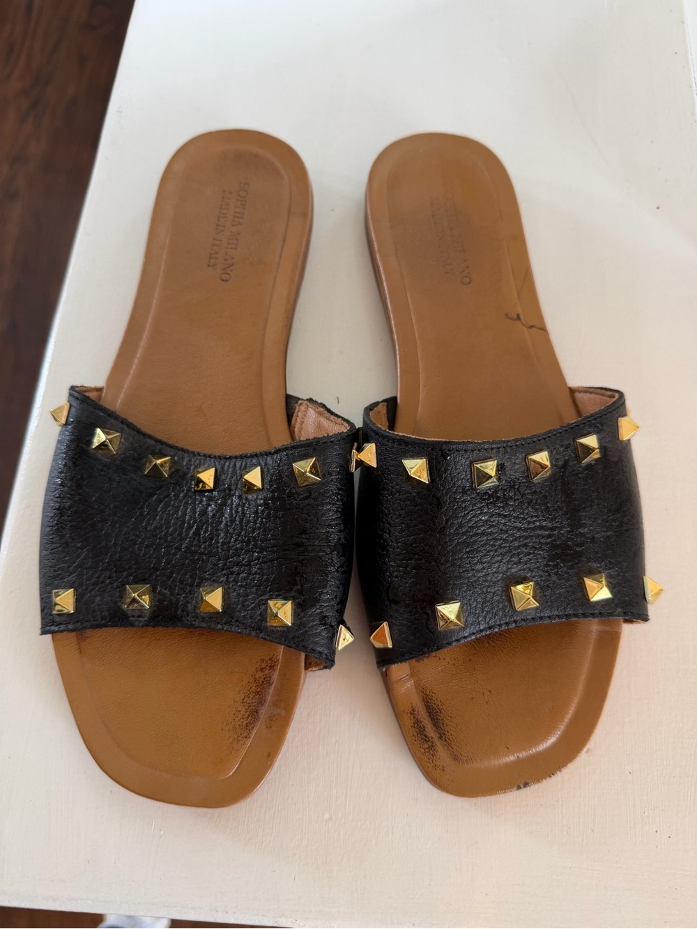 Black Leather Slide Sandals with Gold Stud Accents - Women